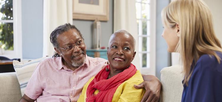 Diverse seniors with a caregiver.